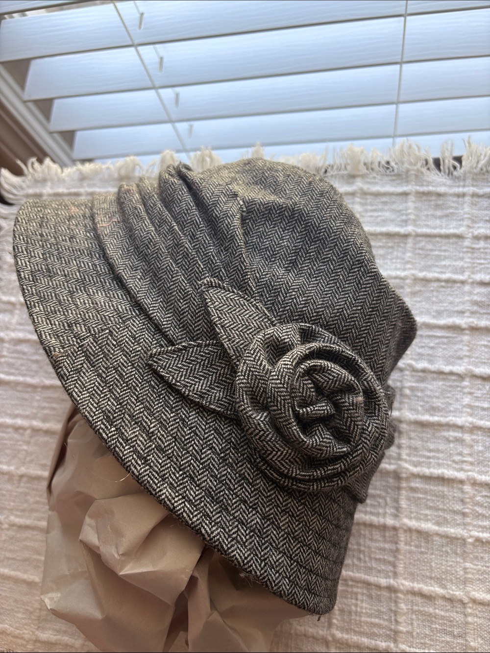Tweed British hat is great gray tweed goes well with dresses, coats and jeans.